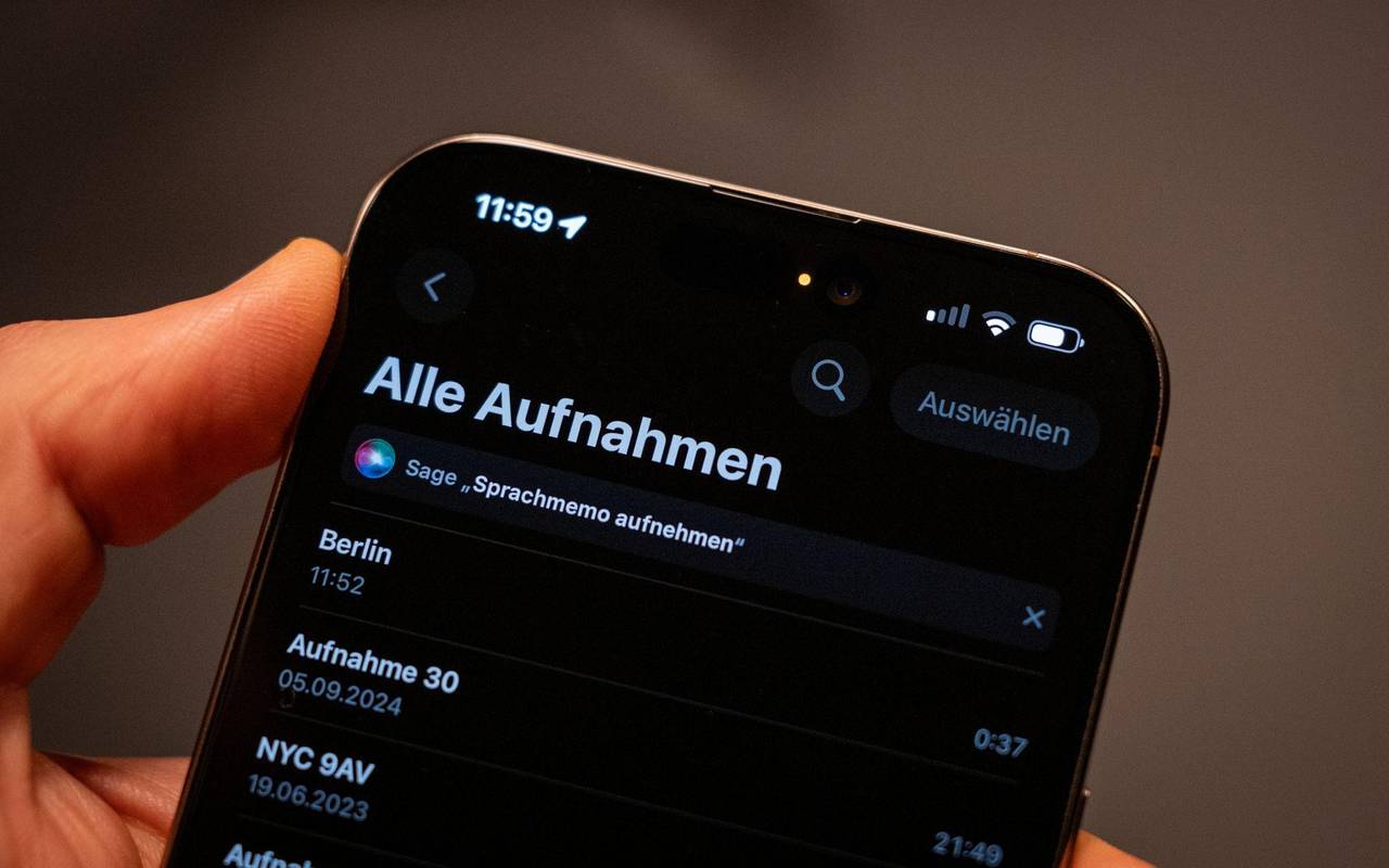 Eine orangefarbene Statusanzeige eines iPhones