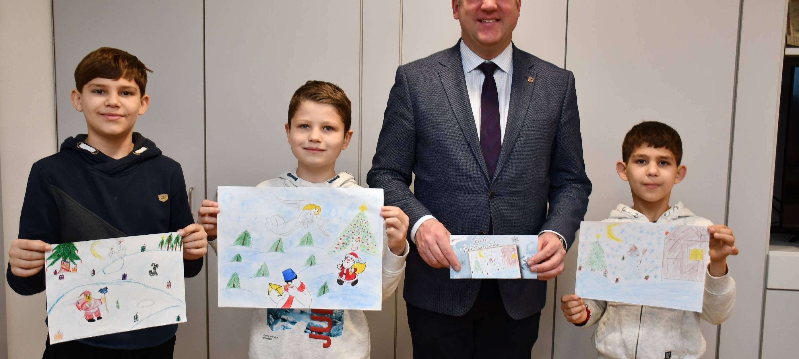 Hürth: Geflüchtete gestalten Weihnachtskarte